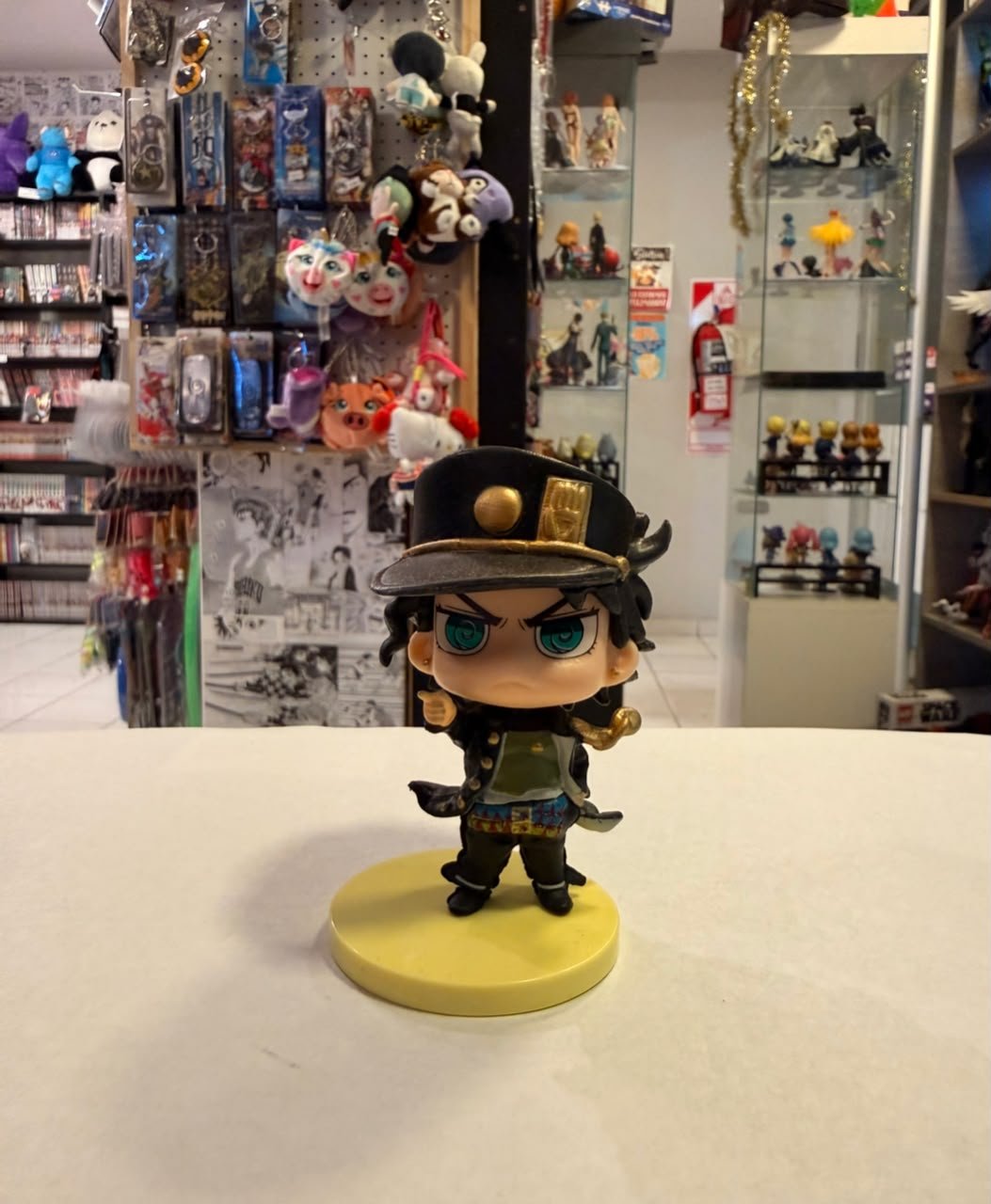 FIGURA GASHAPON DE JOTARO KUJO