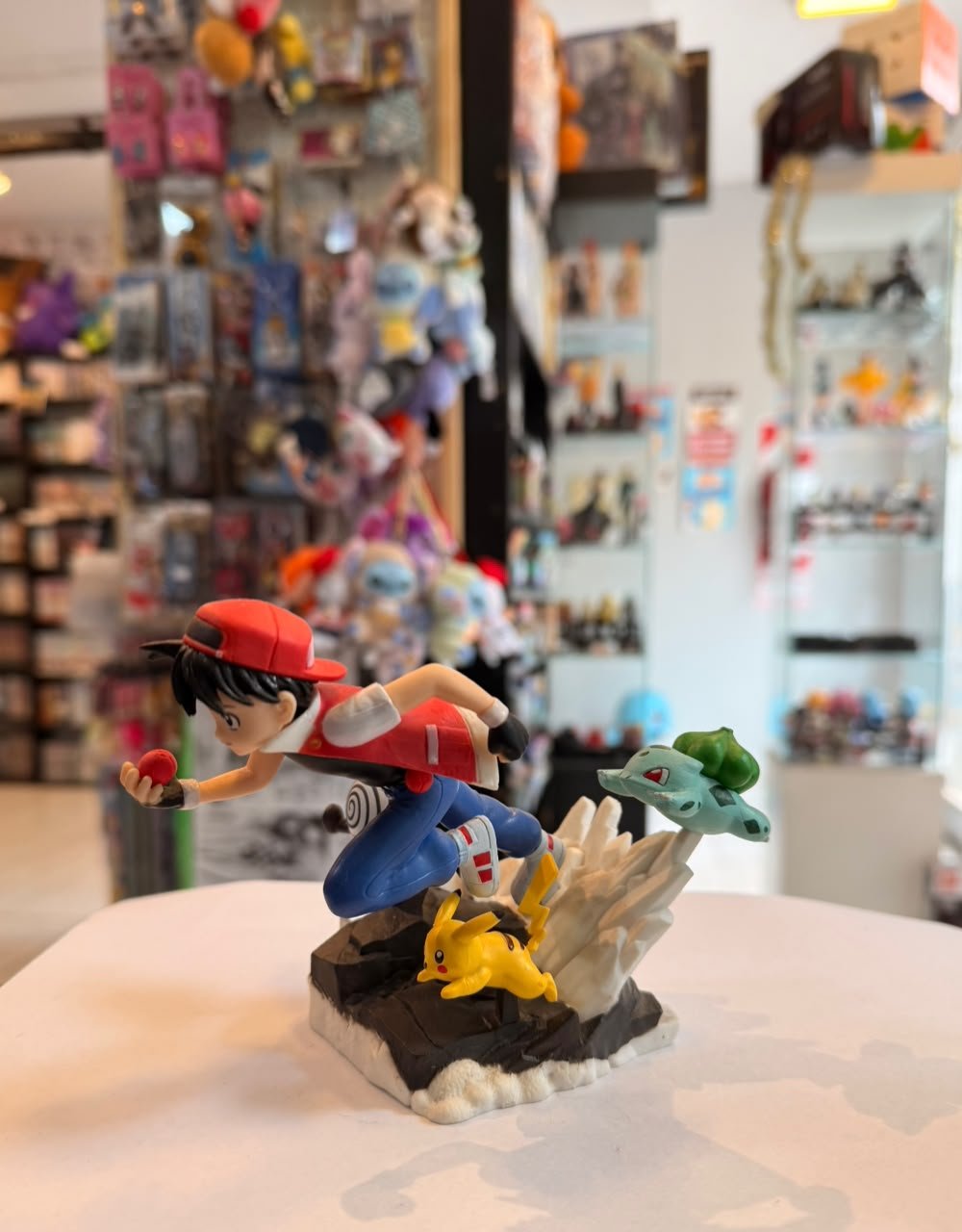 FIGURA DE ASH CON PIKACHU, BULBASAUR Y POLIWHIRL foto 3