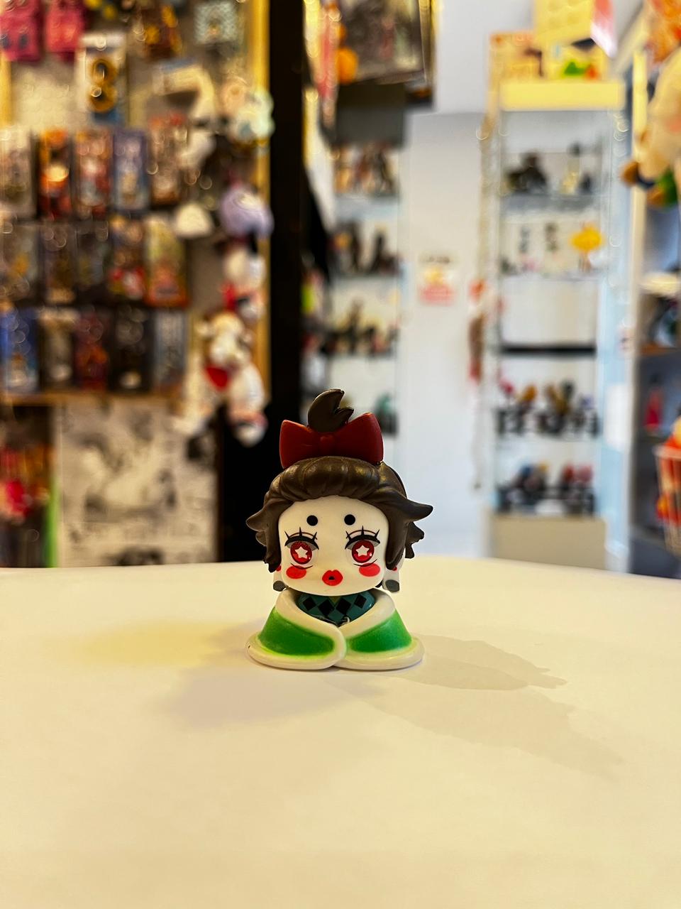 FIGURA GASHAPON DE TANJIRO VERSION DORMIDA
